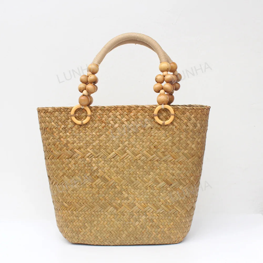 Woven handbag with wooden handles on a white background