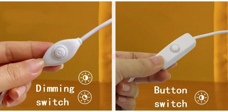 Two hands holding white electronic devices with dimming and button switches on a brown background.