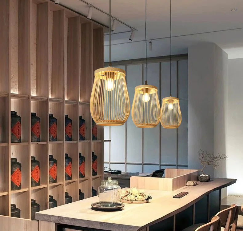 Modern interior design with pendant lights, a dining table, and shelves.