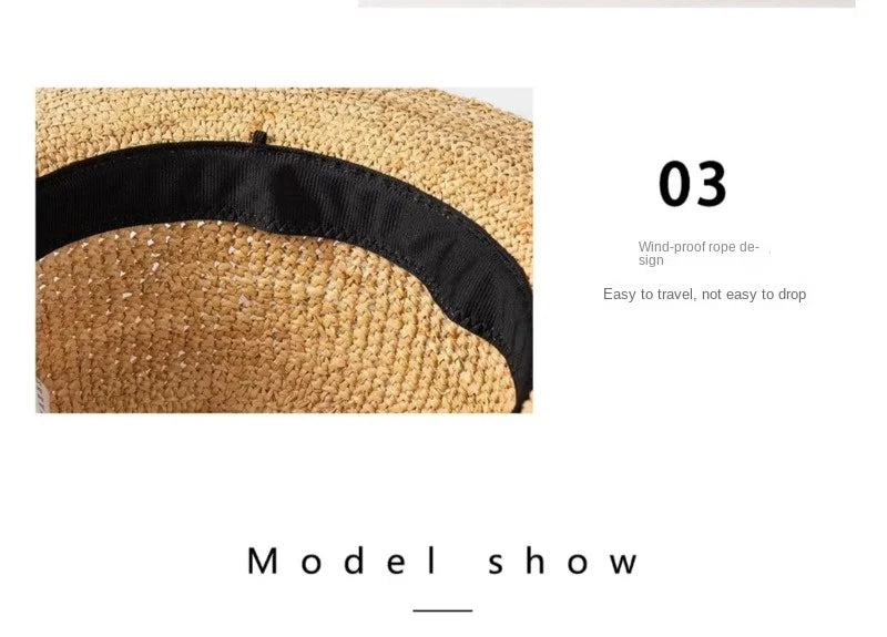 Close-up of a straw hat with black band on a white background
