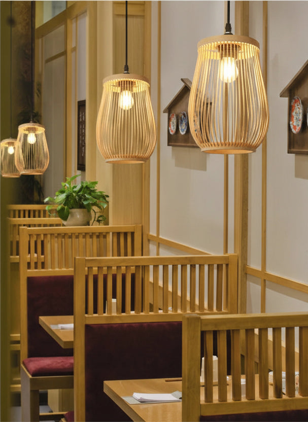 Restaurant interior with wooden furniture and hanging lights
