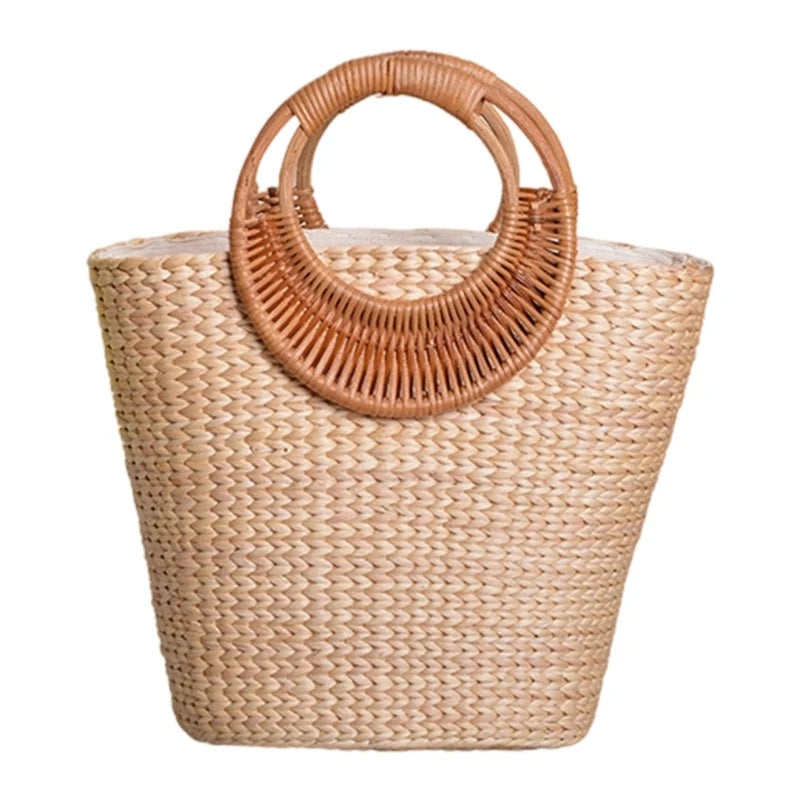 A natural woven straw tote bag with a circular wicker handle, shown against a plain white background.