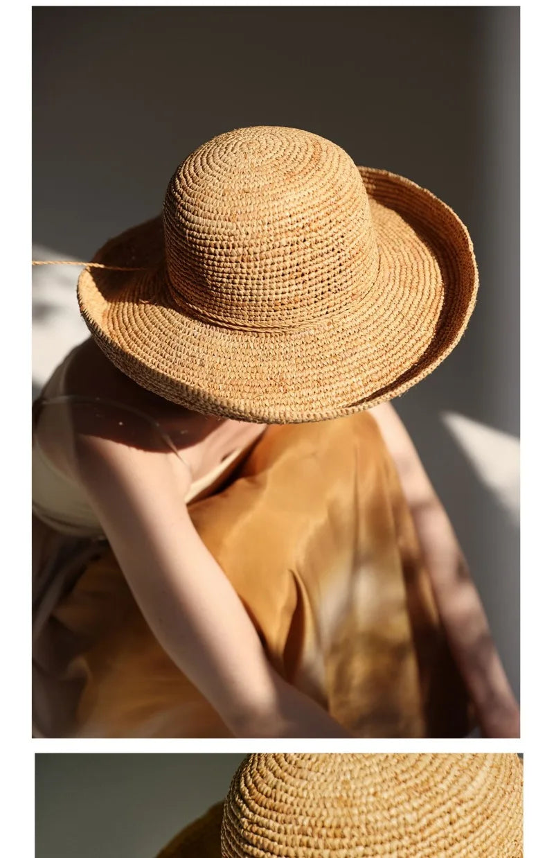 Brown straw hat worn by a person with a blurred background