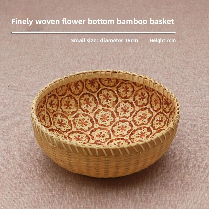 Finely woven flower bottom bamboo basket on a beige background