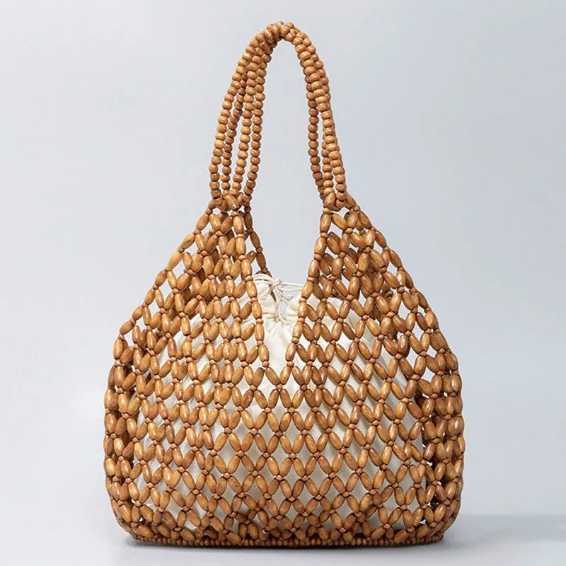 Wooden beaded handbag on a light gray background