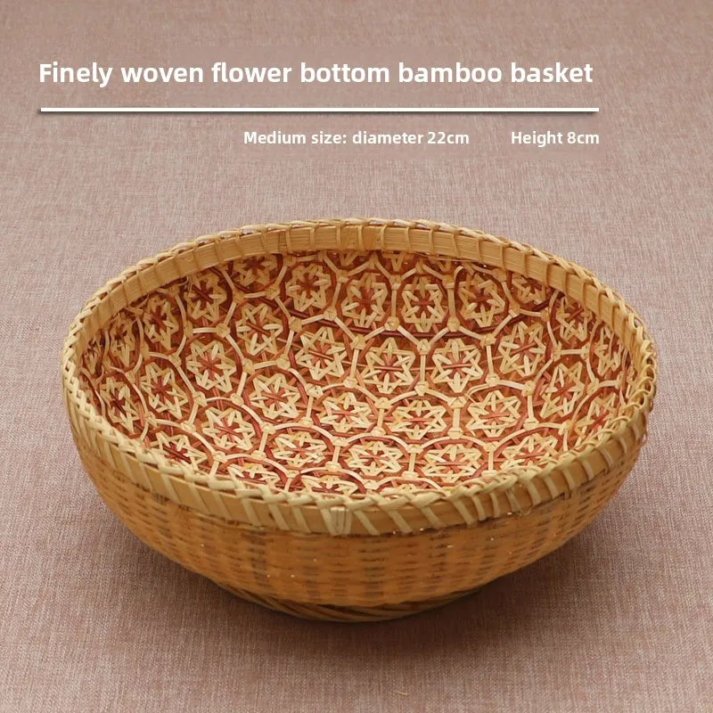 Finely woven flower bottom bamboo basket on a beige background