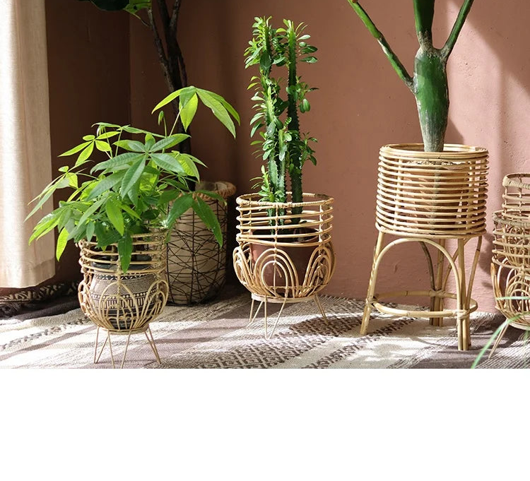 Bamboo planters with plants on a textured surface against a brown wall, featuring the brand 'YUANJIE HOME'.