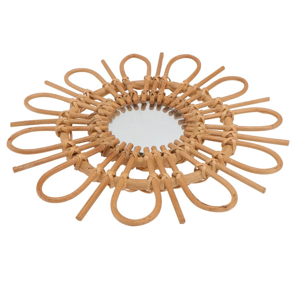 Woven rattan mirror on a white background