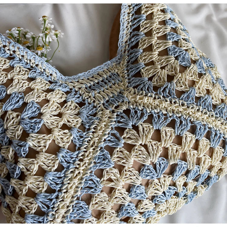 Close-up of a crocheted bag with blue and beige pattern